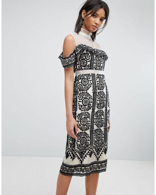 white asymmetric sleeve embroidered bodycon dress