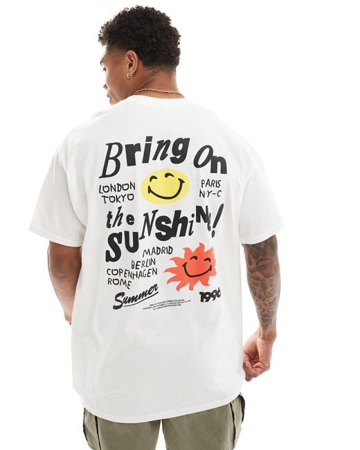 T-shirt oversize bianca con stampa "smile sunshine" sul retro di ASOS in White da Uomo