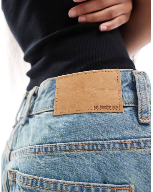 Asos design petite - jean baggy à taille basse - pâle vintage ASOS en coloris Blue