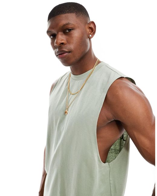 Camiseta holgada sin mangas con estampado ASOS de hombre de color Green