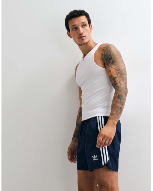 Adidas Originals Blue Adicolor Polyester 3 Stripe Shorter Shorts for men