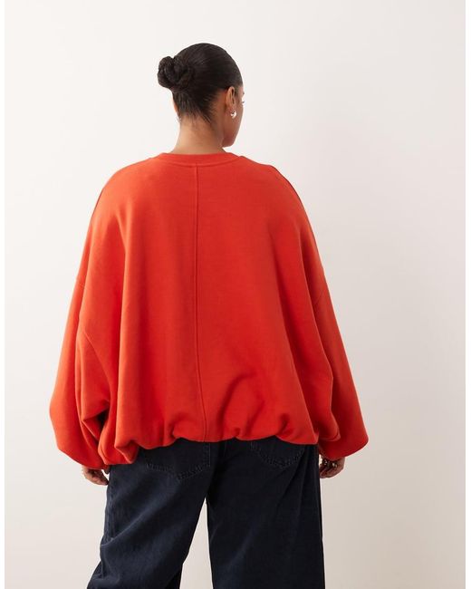 ARRANGE Red Curve Bubble Hem Sweatshirt