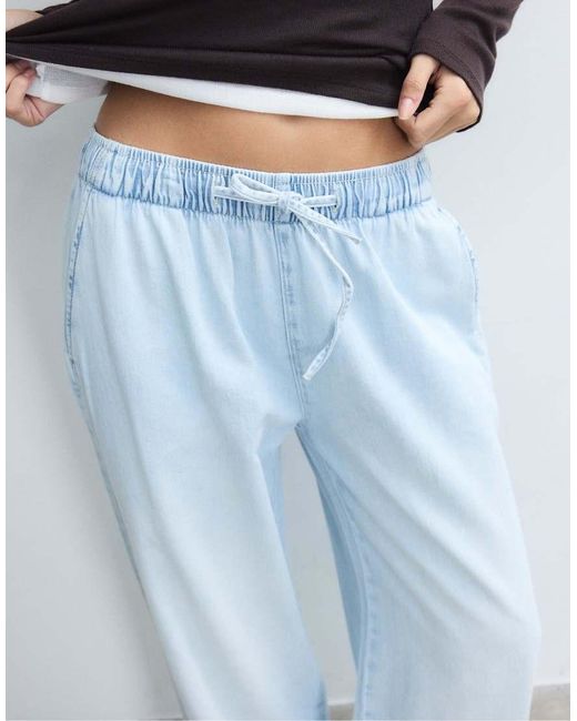 Stradivarius Blue Flowy Denim Trousers With Drawstring