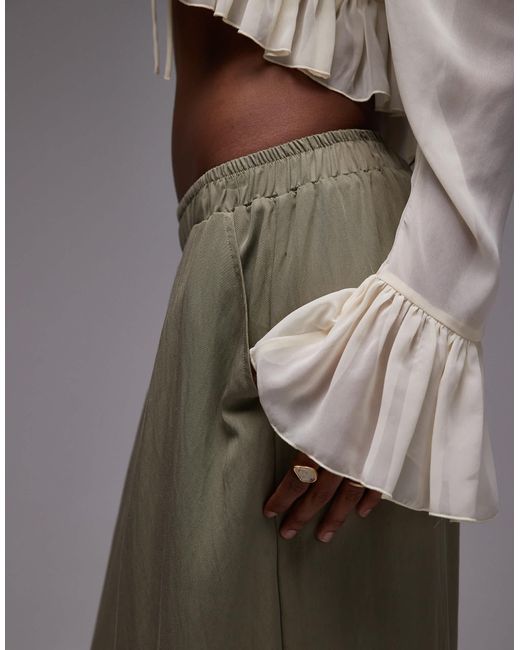 Pantalon ultra ample avec liens noués à la taille - pistache ASOS en coloris Green