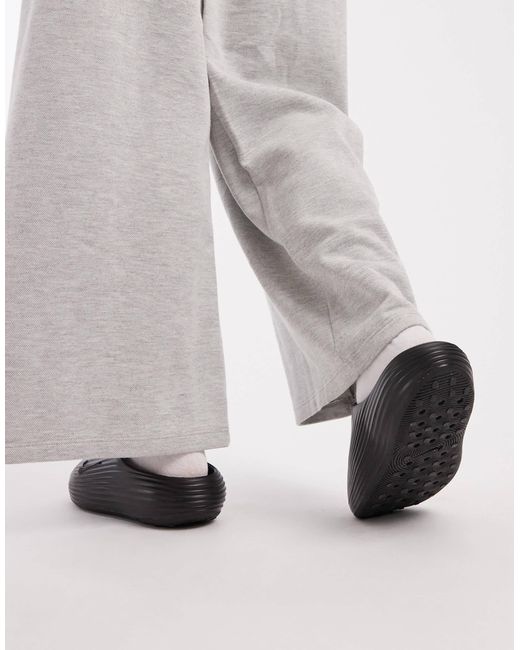 Nike Black – reactx rejuven8 – slider