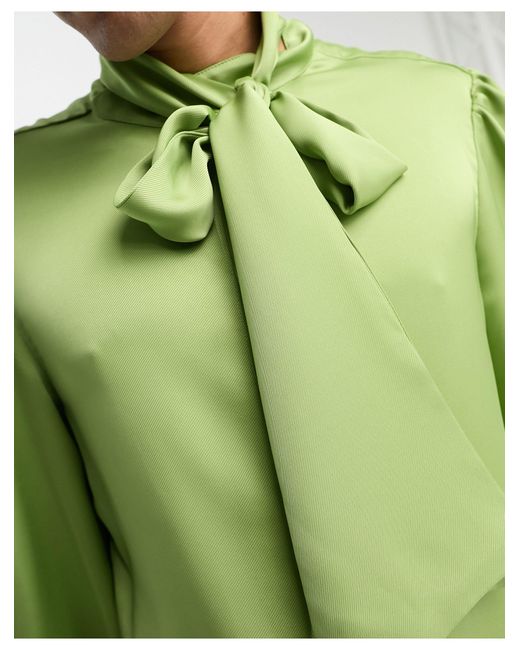 Camisa color unisex con lazada al cuello Sister Jane de color Green