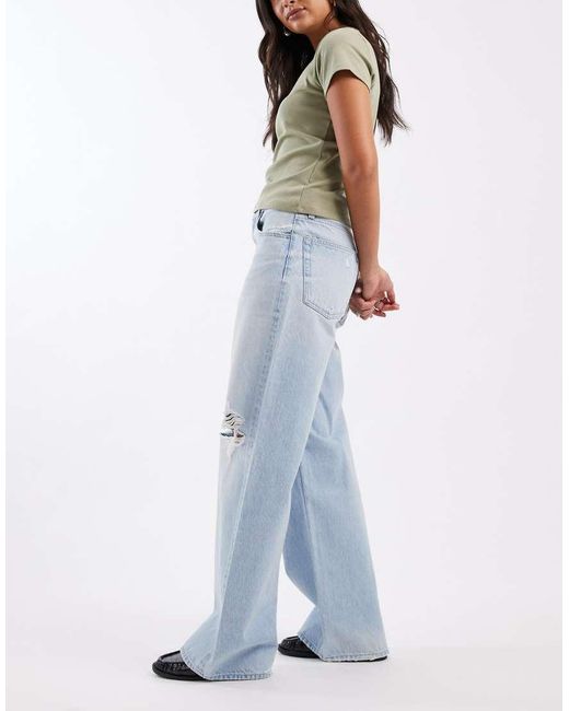 Calvin Klein Blue Low Rise Baggy Jeans With Rip Details