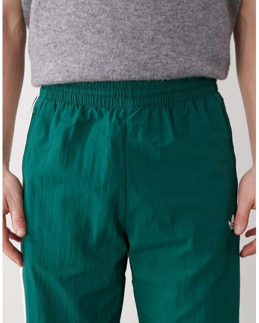 Adidas Originals Green Firebird Woven Track Pants for men