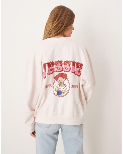 ASOS Pink Disney Pixar Oversized Cardigan With Jessie Toy Story Print