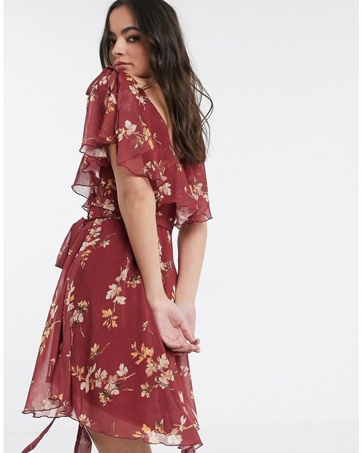 cape back dipped hem mini dress