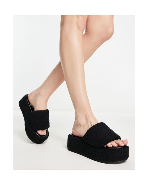 Sandalias negras con plataforma plana de ASOS de color Negro | Lyst