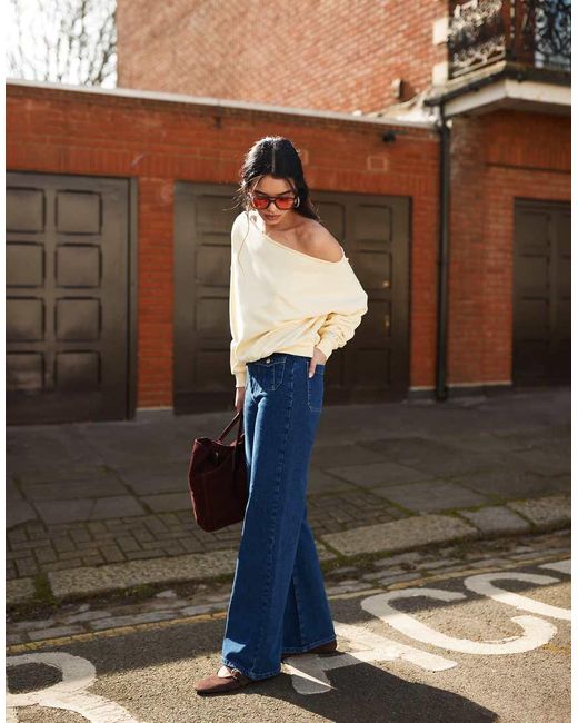 Jeans A Fondo Ampio Medio Scuro Con Tasche Sul Davanti di ASOS in Blue