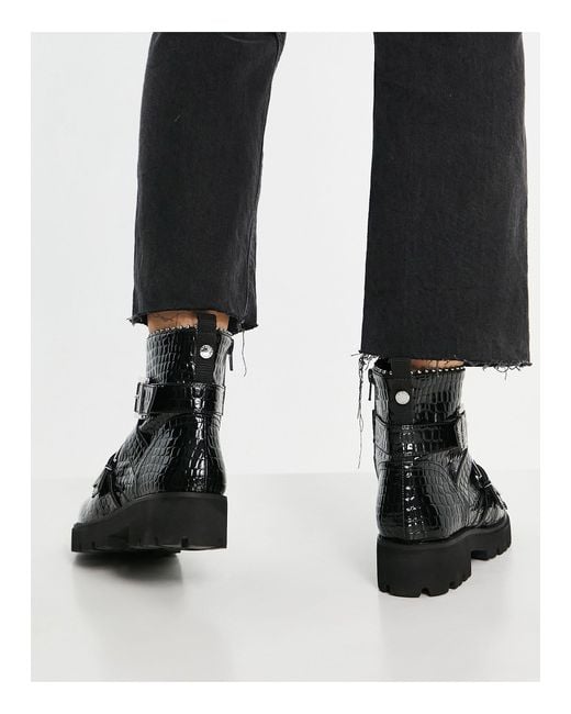 Steve Madden Hoofy Chunky Buckle Flat Boots in Black | Lyst UK