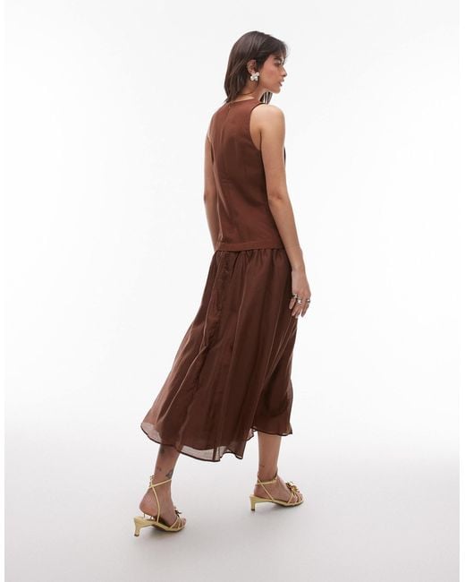Robe longue en lin à taille basse et ourlet transparent - chocolat Mango en coloris Brown