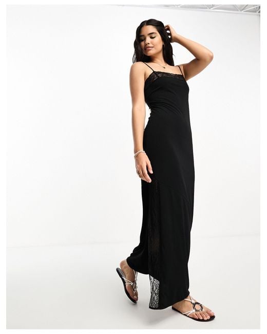Black high neck asymmetric cheap embroidered trim maxi dress