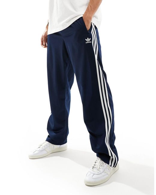 Adidas Originals Blue Firebird Track Pants for men