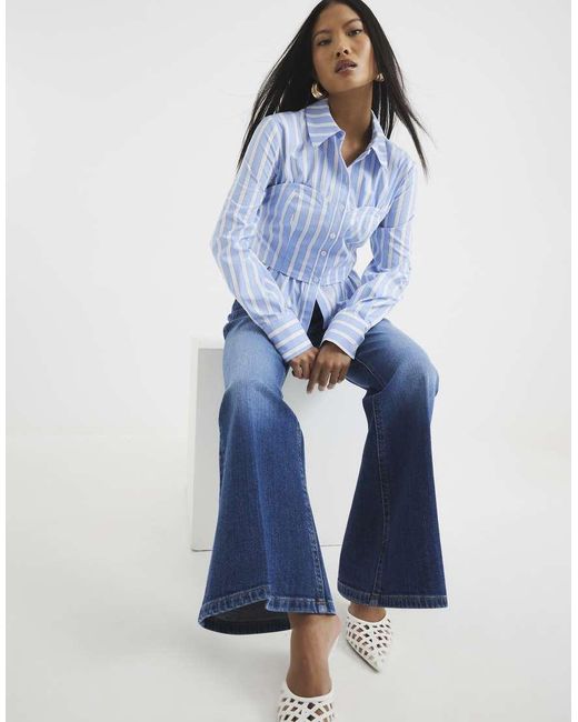 River Island Blue High Rise Relaxed Flare Jeans