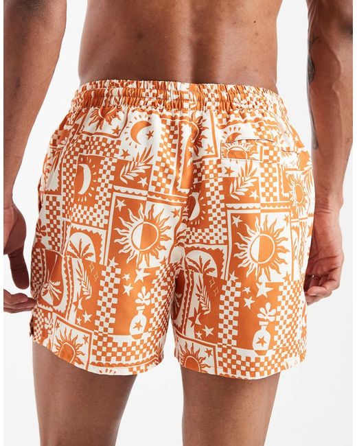 Aray Orange Sundial Print Swim Shorts for men