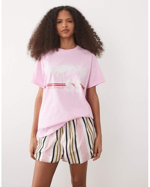 ASOS Pink Oversized Raglan Sleeve T-shirt With Palm Springs Sports Graphic