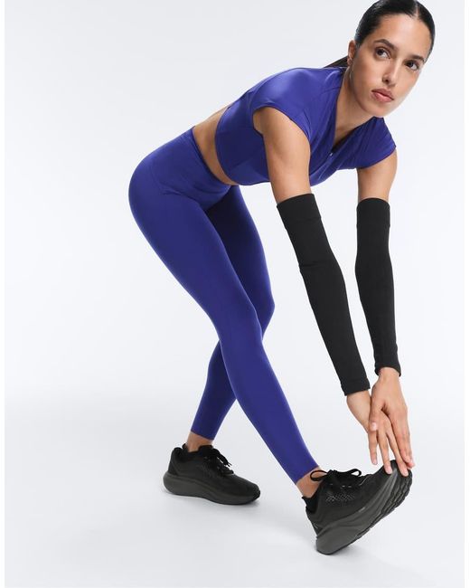 Oysho Blue High Rise Compressive Reflective Ankle-length leggings