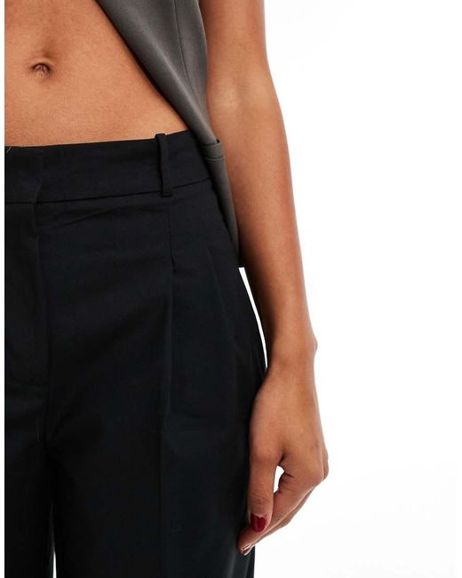 Pantalones Negros De Talle Medio Y Corte Holgado De Mango de color Black