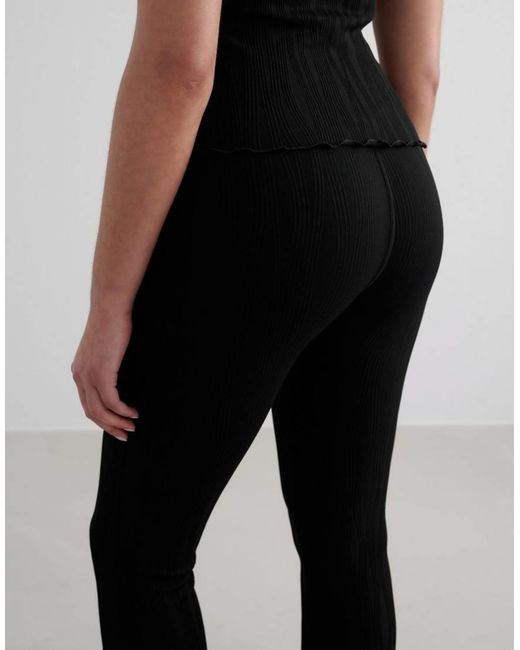 Mallas Negras De Corte Acampanado Tulip De Aim'n de color Black