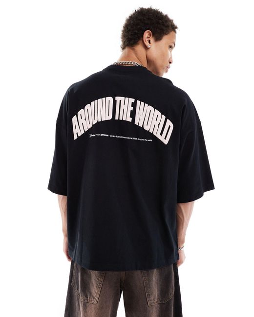 Dr. denim - curtis - t-shirt nera oversize con grafica "around the world" rosa stampata sul retro di Dr. Denim in Black da Uomo
