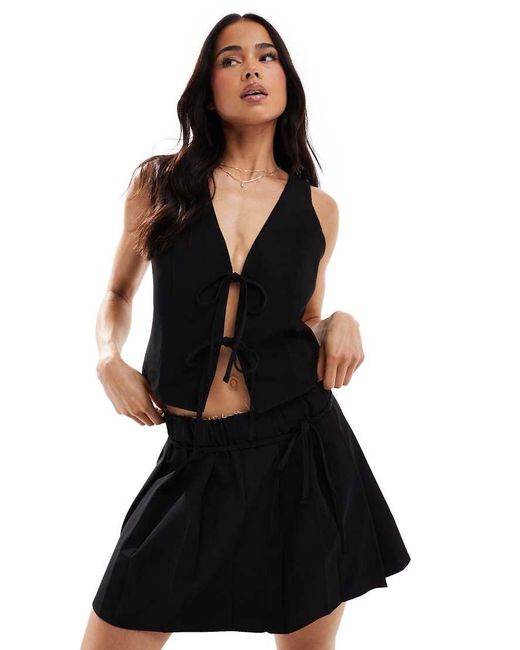 Pull&Bear Geplooide Mini Rok Met Strikdetail in het Black