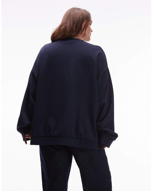 ASOS Blue Weekend Collective Curve Oversized Sweat With Athleisure Studio Graphic