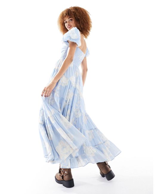 Robe texturée longueur mollet à manches bouffantes et imprimé fleuri - ciel Free People en coloris Blue