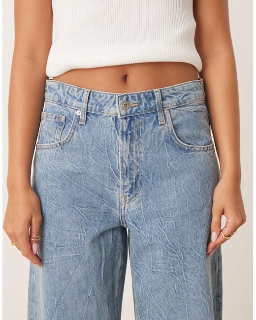 Jean baggy en coton texturé à taille basse - clair Mango en coloris Blue