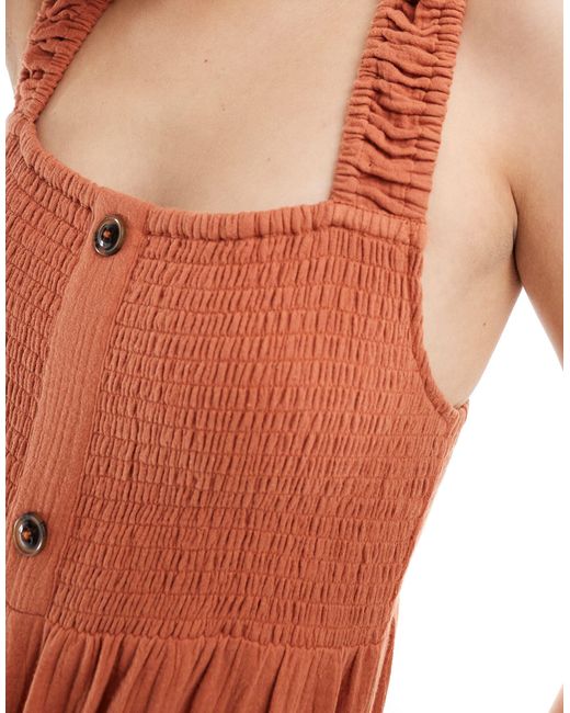 Tuta jumpsuit color ruggine con fascette elasticizzate e corpino arricciato di ASOS in Orange