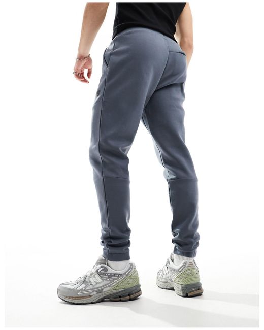 New Balance Blue Active Tapered Fit Logo Trackpants for men