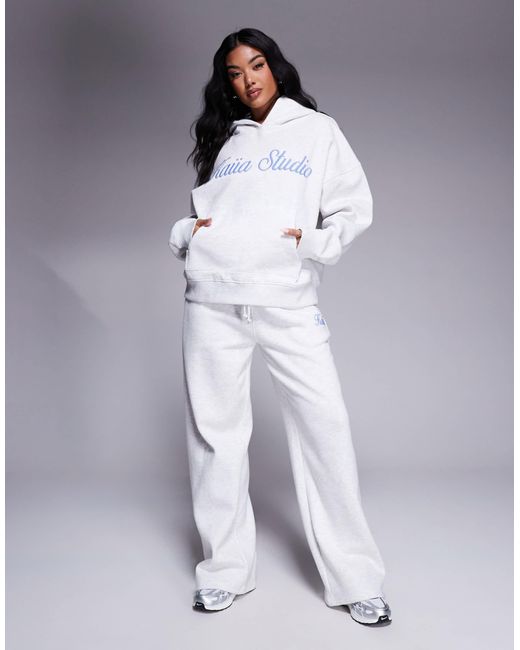 Sweat à capuche d'ensemble en coton mélangé avec logo script brodé - chiné et bleu Kaiia en coloris White