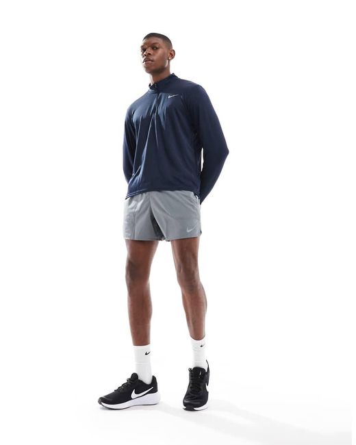 Top Con Cremallera Corta Dri-Fit Pacer De Nike de hombre de color Blue