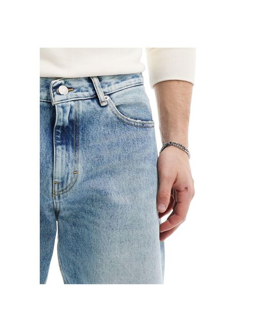 Tommy Hilfiger – isaac – lässig geschnittene, schmal zulaufende jeans in Blue für Herren