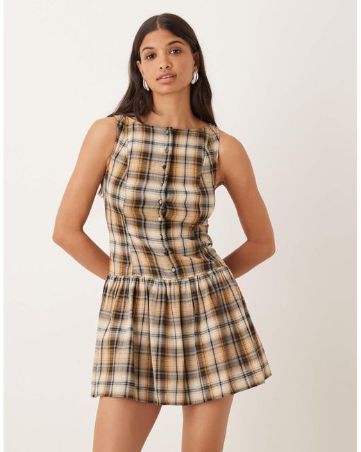 Robe courte boutonnée à encolure bateau et taille basse - jaune à carreaux ASOS en coloris Brown
