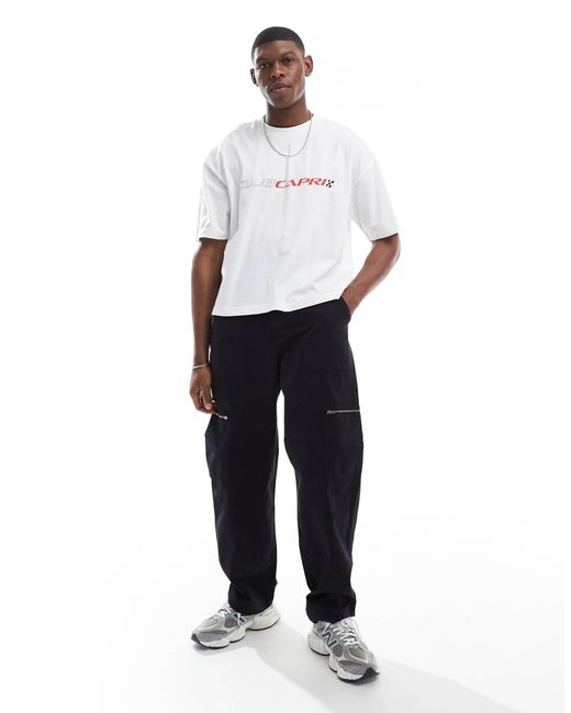 T-shirt coupe carrée oversize avec motif ville ASOS pour homme en coloris White