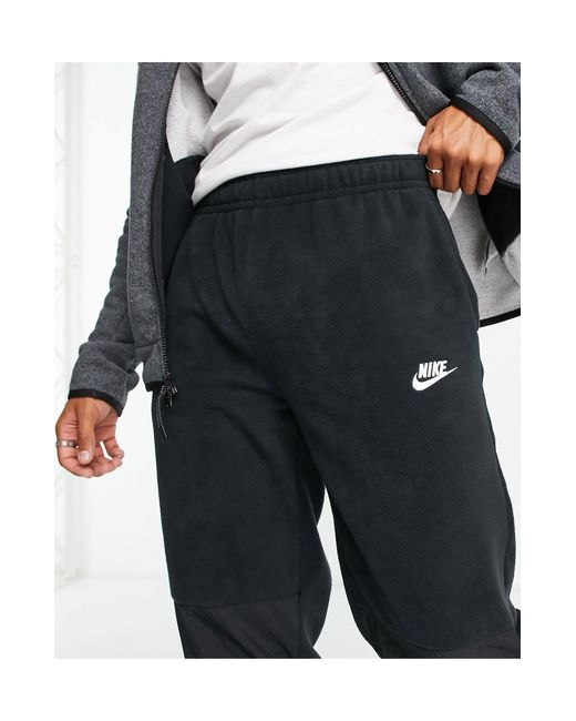 Nike Club Winter Cuffed joggers in Black for Men | Lyst