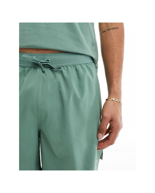 PUMA Running – evolve – shorts aus webstoff in Green für Herren