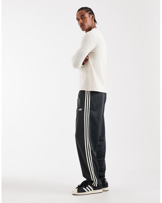 Adidas Originals White Firebird Track Pants for men
