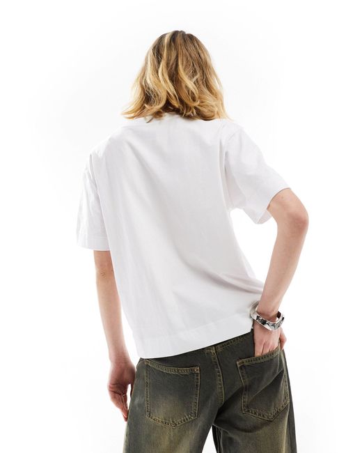 T-shirt bianca con logo sulla tasca di Lee Jeans in White