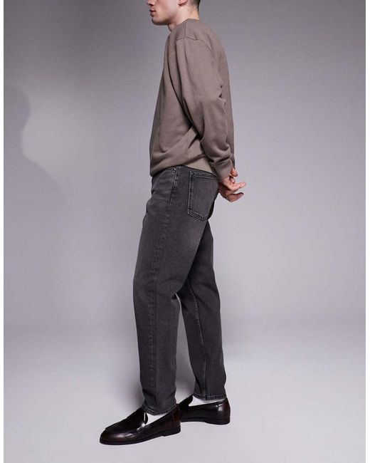 Vaqueros Negros De Corte Tapered Con Lavado Grisáceo De ASOS de hombre de color Gray