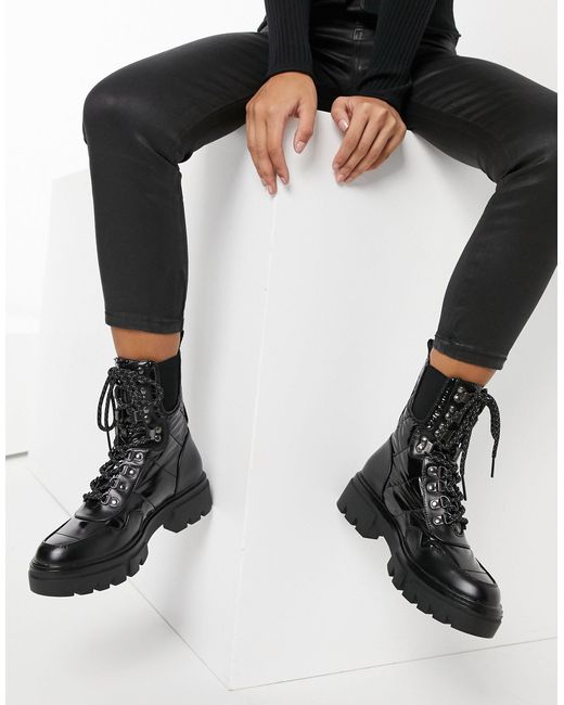 Botas negras brillosas new arrivals