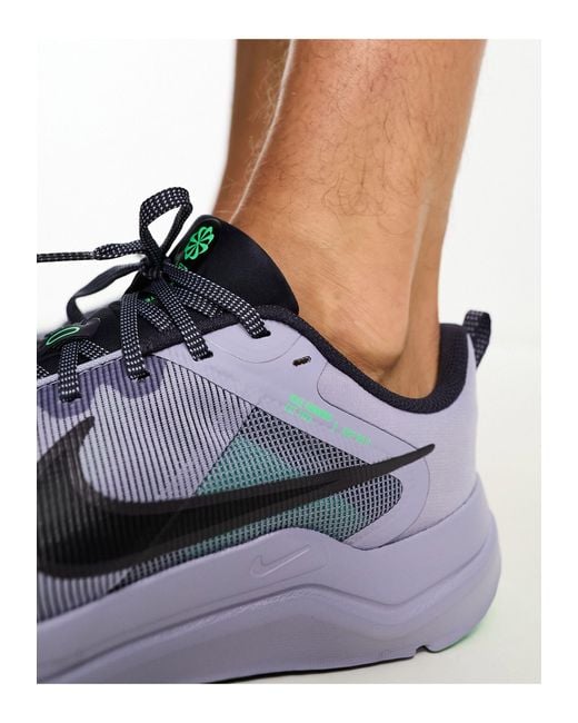 Nike downshifter 2025 heren blauw
