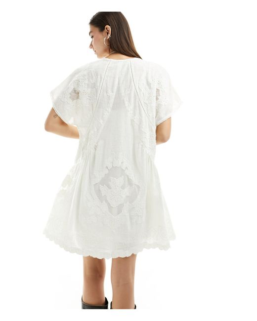 Vestito corto color avorio con inserto di Free People in White