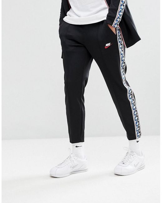 Nike Joggers With Taped Side Stripe In Regular Fit In Black Aj2297-010 for men
