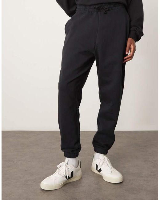 Joggers Negros Básicos Extragrandes De ASOS de hombre de color Black
