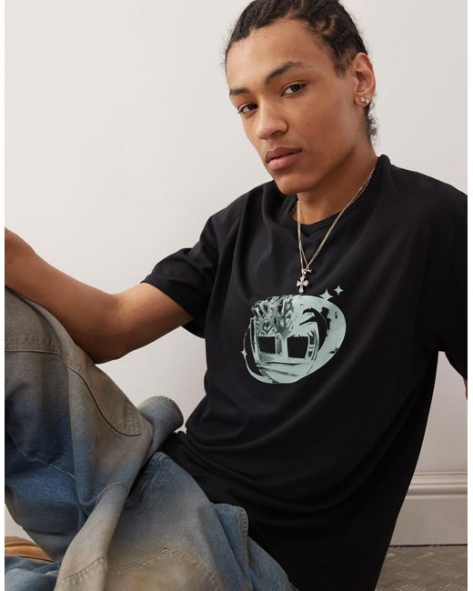 T-shirt avec logo sur la poitrine Timberland pour homme en coloris Black