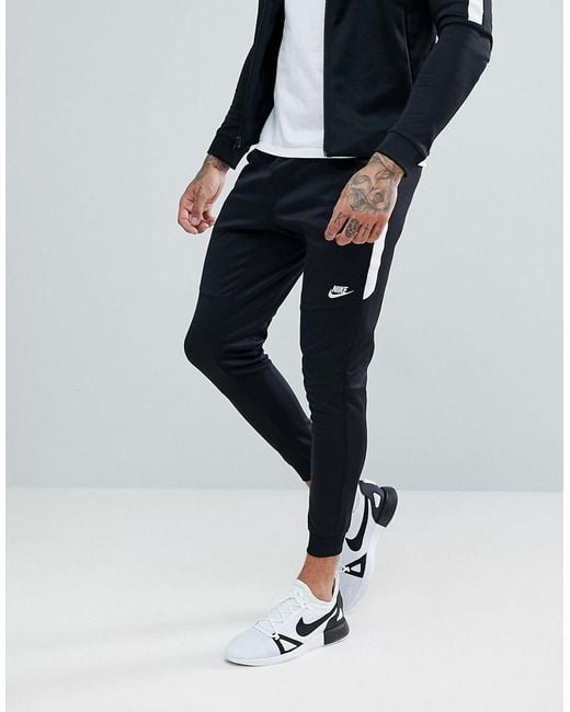 Nike Tribute Poly joggers In Black 884898-010 for men
